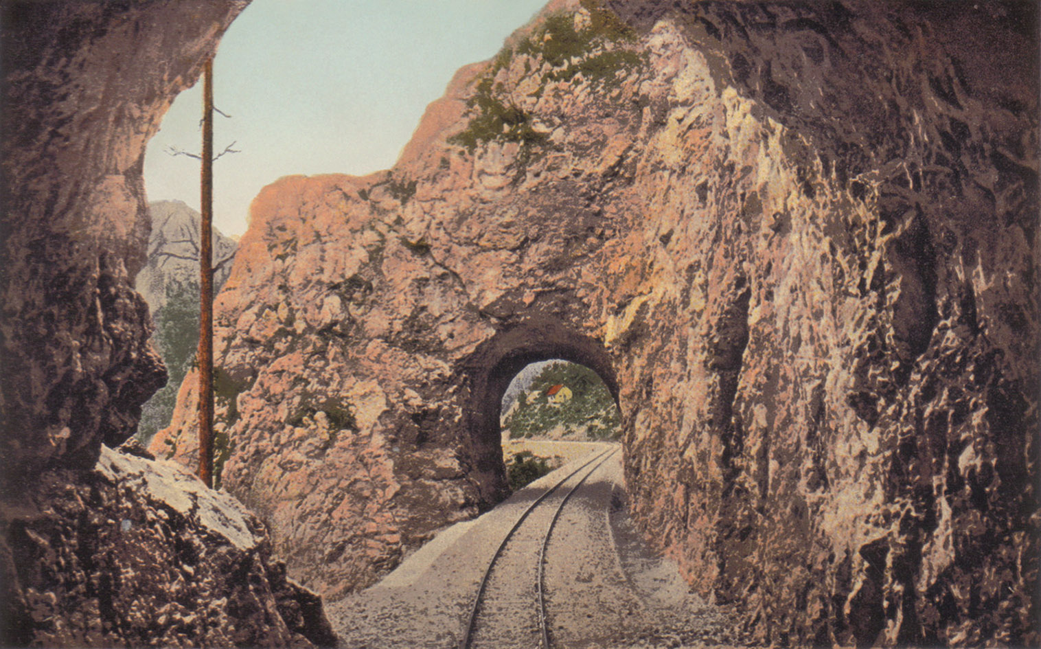 The western portal of the tunnel No. 7 as seen from the tunnel No. 6 towards Pale. Studnička & Co., Sarajevo, Old postcard, © public domain